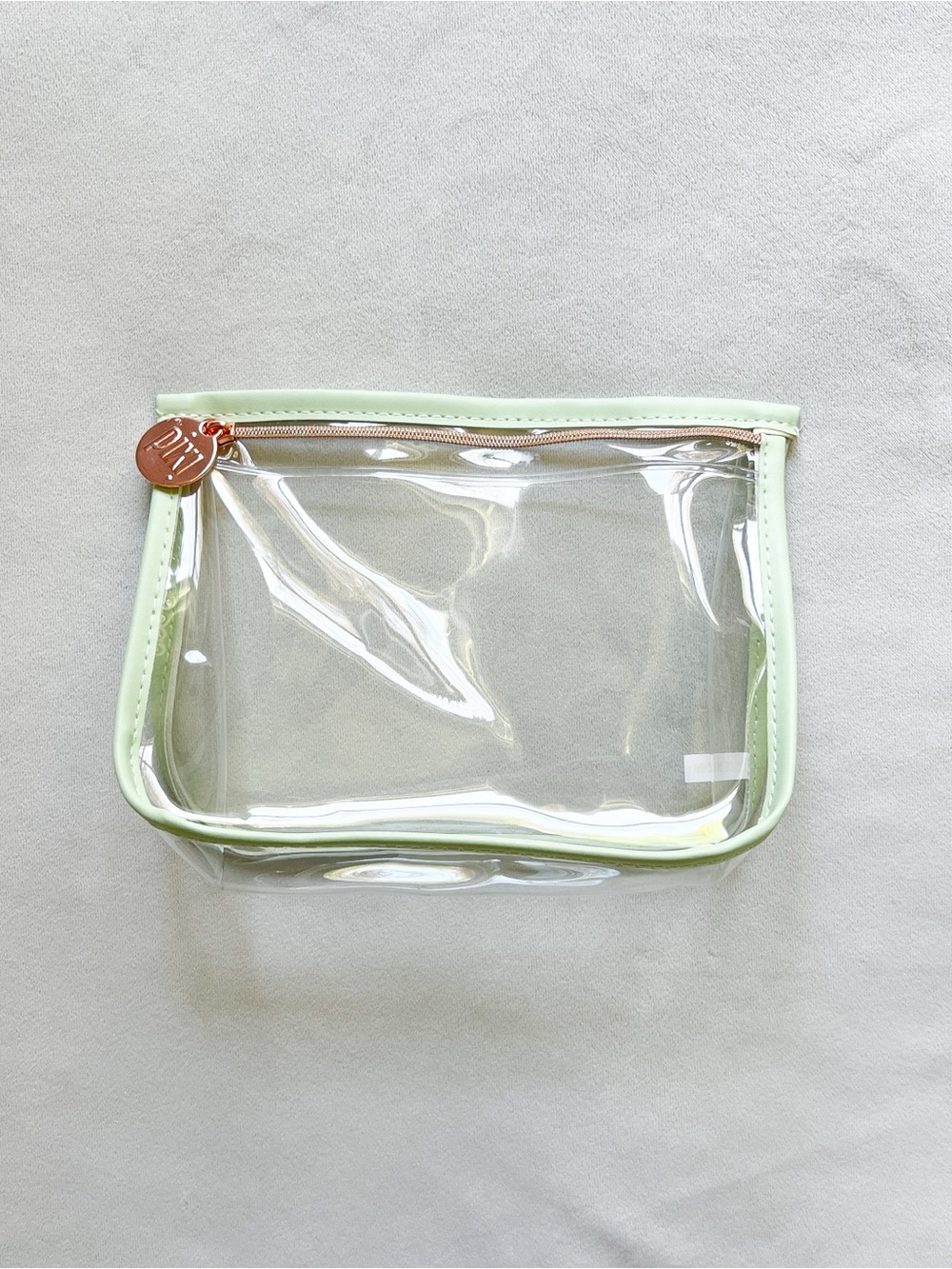Pixi Clear Cosmetic Pouch with Mint Trim and Rose Gold Pull